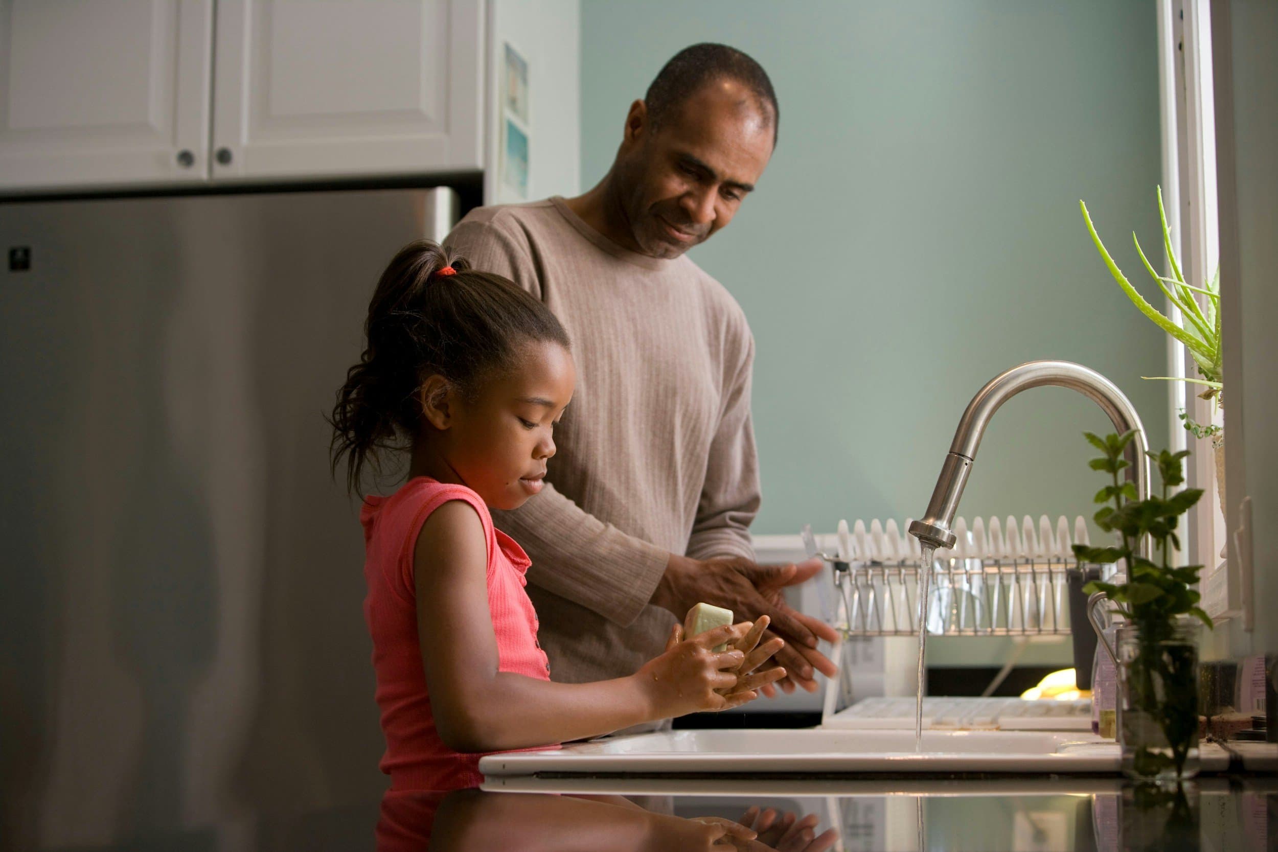 Parent and child representing New Mexico family health coverage