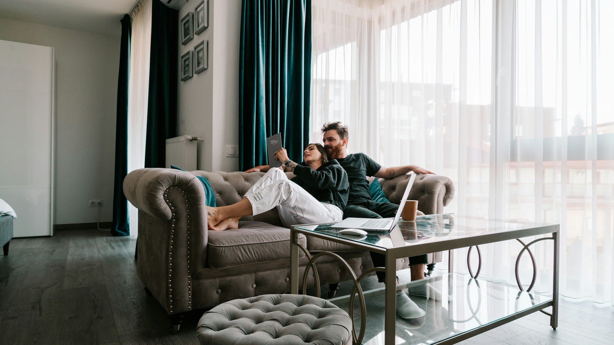 Working couple at home considering income protection